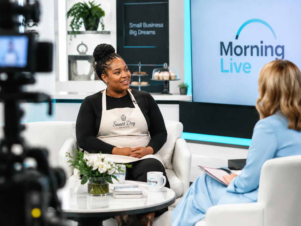 A small business owner being interviewed on a morning TV show